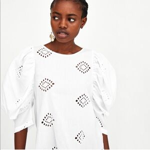 Top with cutwork embroidery